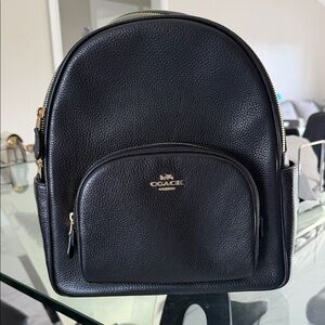 Coach Black Leather Backpack with Gold Accents